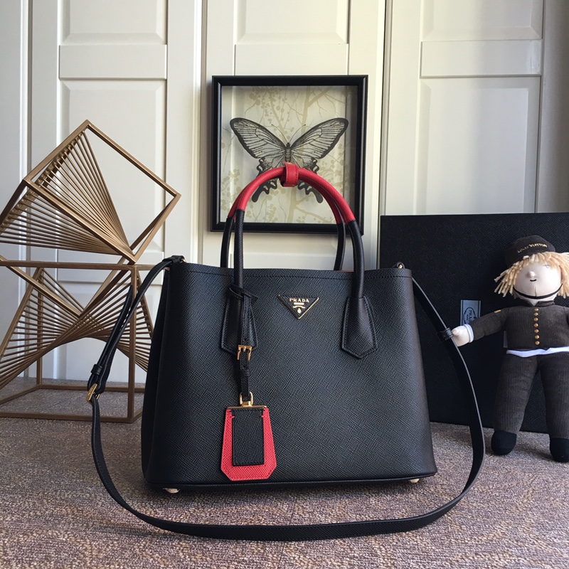 Pra*a top handle bags